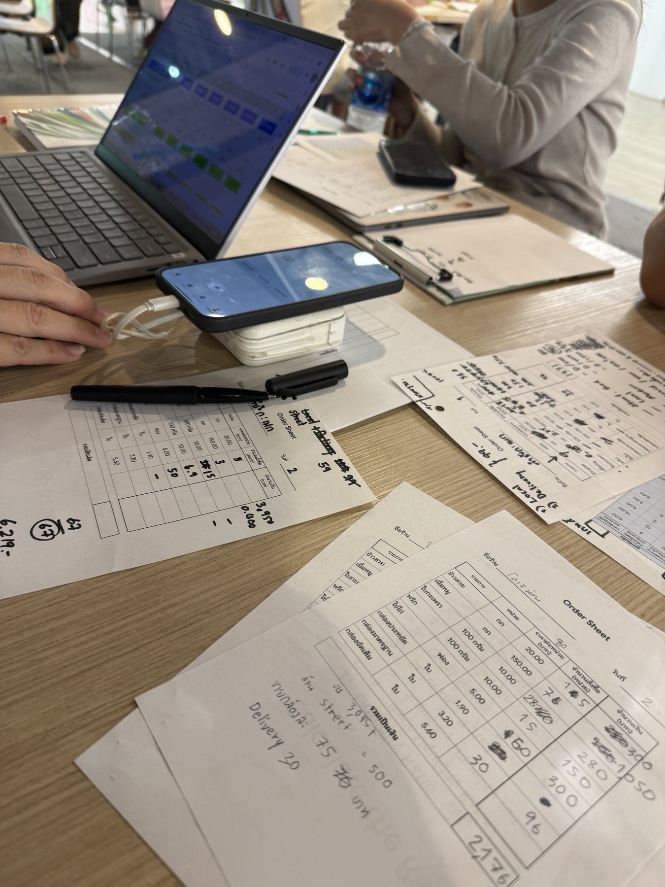 Planning documents and laptop